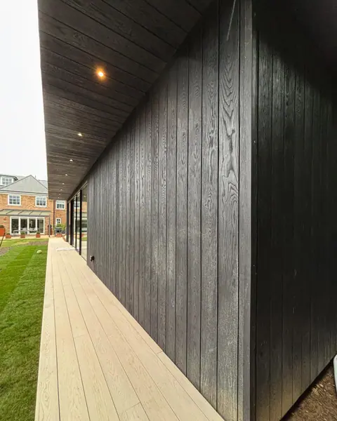 Here is the “garden room” a sauna, gym and golf simulator. All timber frame fini