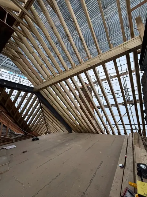 The latest little mission. Not the roof just the 8”x3”s @ 300 centers! Me and Na